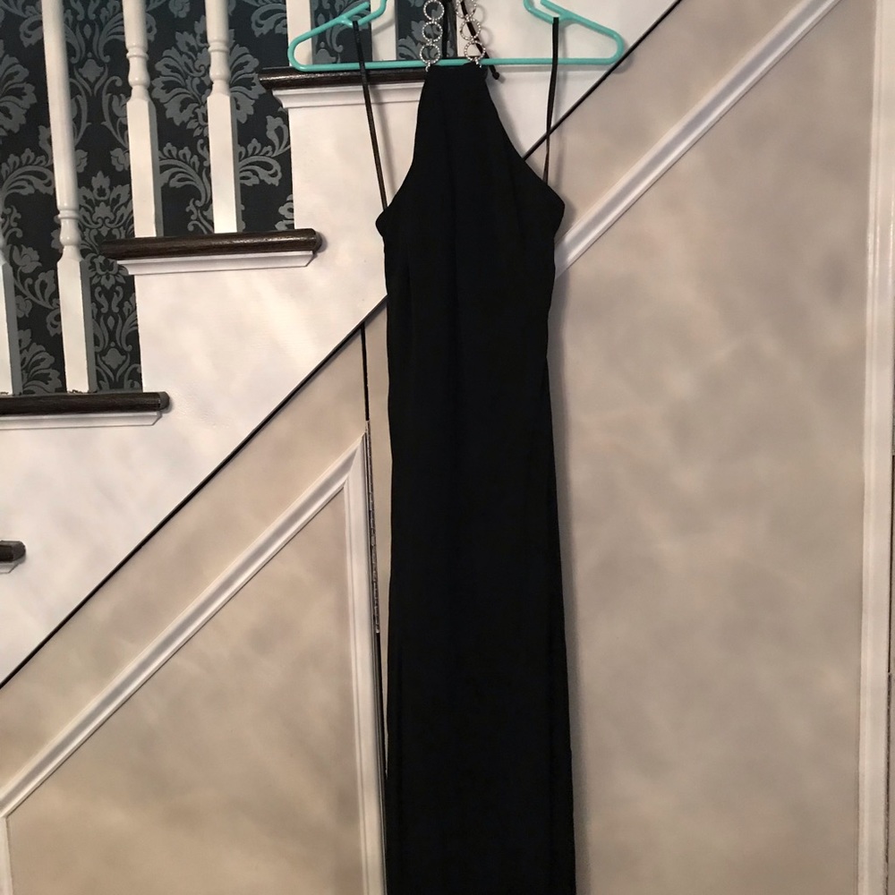 Black evening dress. Diamond halter neck.